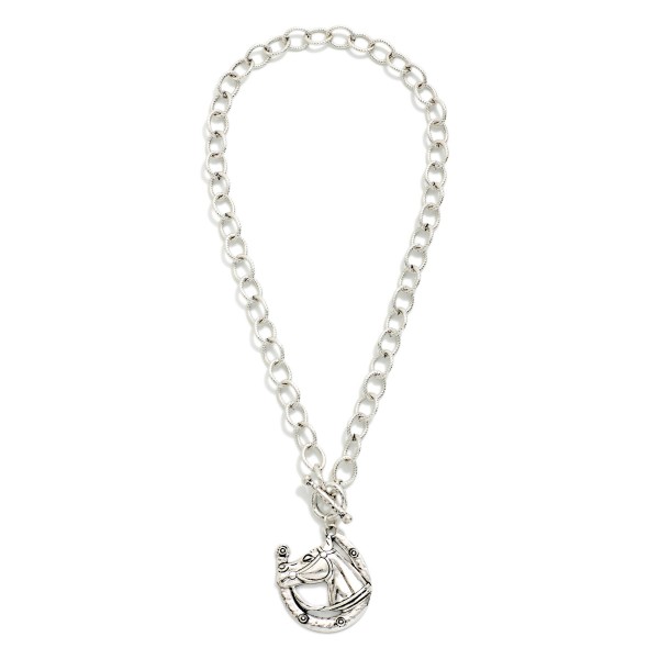 Metal Tone Circle Chain Link Necklace Toggle Clasp And Medallion Horse Pendant 

- Approximately 20" L  
