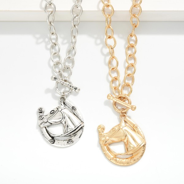 Metal Tone Circle Chain Link Necklace Toggle Clasp And Medallion Horse Pendant 

- Approximately 20" L  