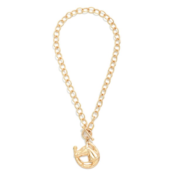 Metal Tone Circle Chain Link Necklace Toggle Clasp And Medallion Horse Pendant 

- Approximately 20" L  
