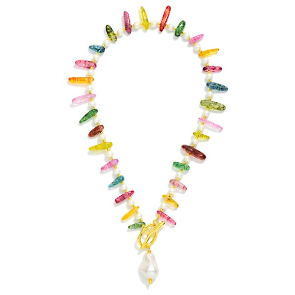 Beaded Necklace Featuring Pearls, Gold Tones, And Natural Stone Stations With Toggle Clasp And Baroque Pearl Pendant 

- Approximately 16" L 