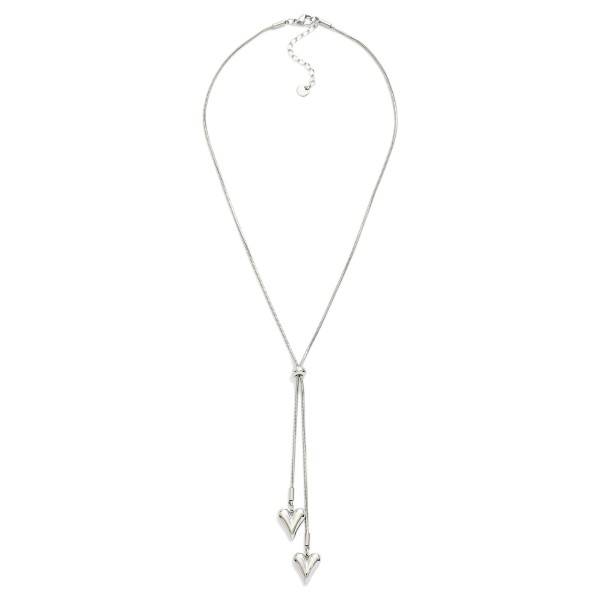 Snake Chain Bolo Style Necklace Featuring Heart Pendents 

- Approximately 22" L 
- Stainless Steal
- Water Resistant
