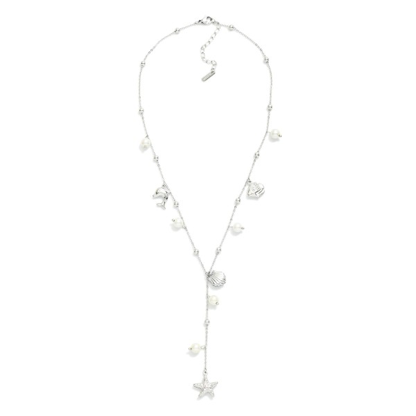 Chain Link Charm Necklace Featuring Pearls & Metal Tone Beach Charms 

- Approximately 20" L 
- Stainless Steal
- Water Resistant