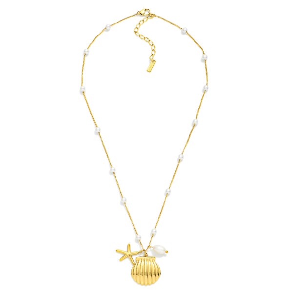 Metal Tone Chain Link Necklace Featuring Pearl Stations & Shell Pendant 

- Approximately 16" L 
- Stainless Steal
- Water Resistant
