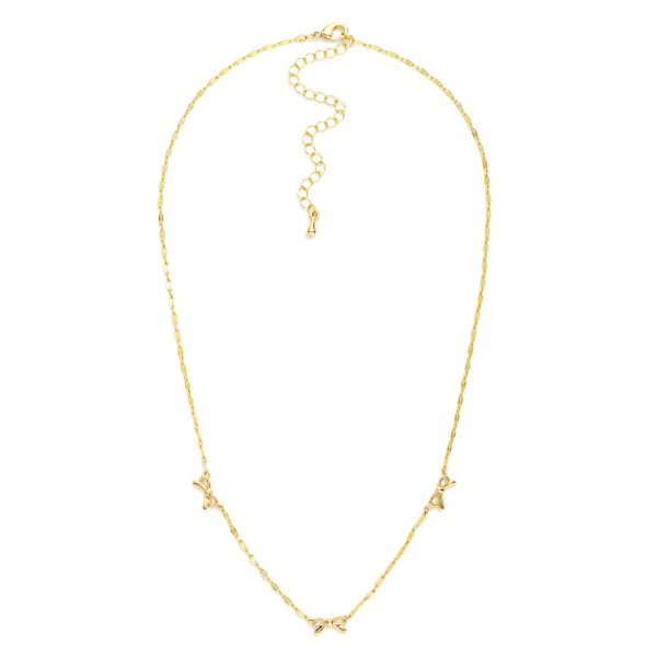 Flat Chain Link Necklace Featuring Metal Tone Bow Stations 

- Gold Dipped
- Approximately 16.5" L
- Extender 2" L