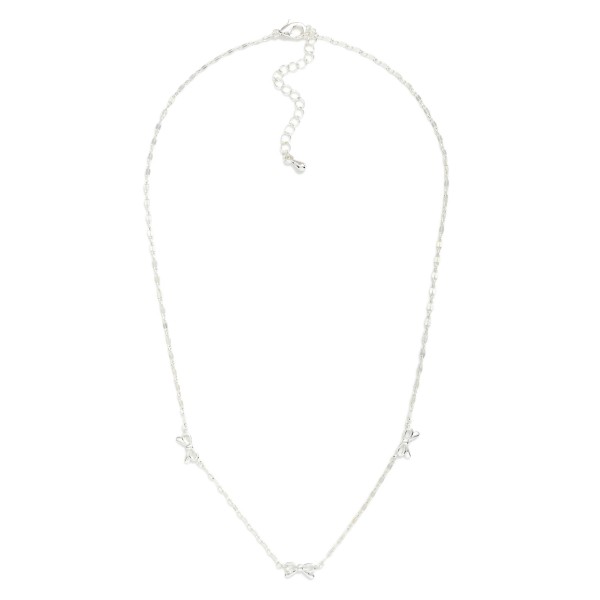 Flat Chain Link Necklace Featuring Metal Tone Bow Stations 

- Gold Dipped
- Approximately 16.5" L
- Extender 2" L