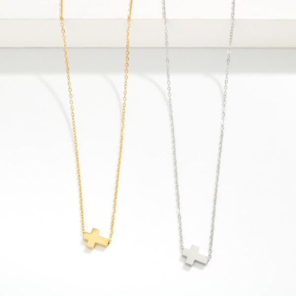 Dainty Chain Link Necklace Featuring East West Cross Pendant 

- Approximately 14" L 
- Extender 3" L 
- Stainless Steal
- Water Resistant
