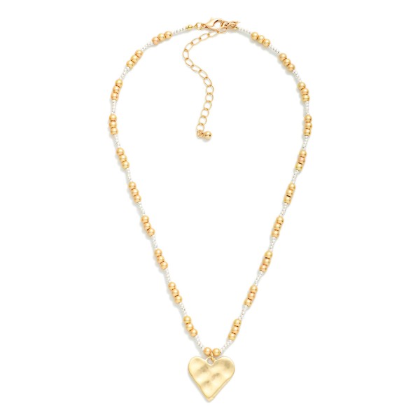 Metal Tone Metallic Beaded Necklace Featuring Hammered Heart Pendant 

- Approximately 16" L
- Extender 2" L 