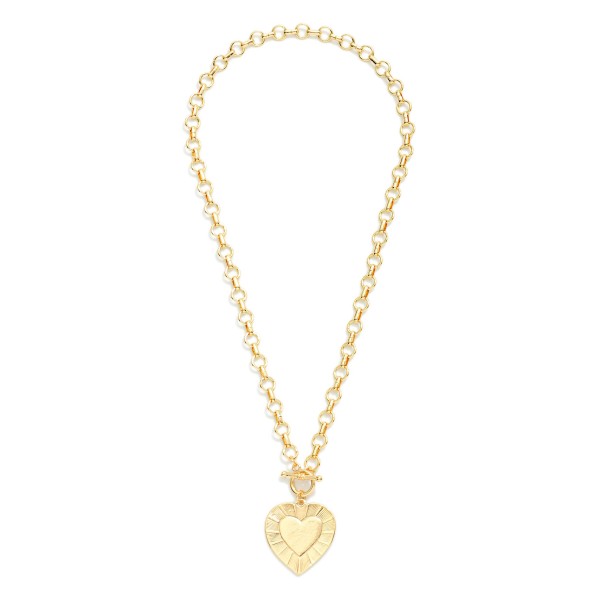 Metal Tone Circle Chain Link Necklace Featuring Heart Pendant & Toggle Clasp 

- Approximately 18" L 