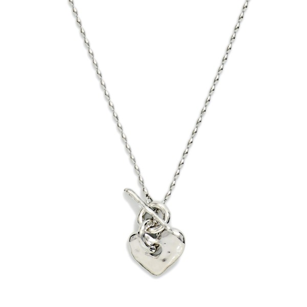 Metal Tone Oval Bead Beaded Necklace Featuring Hammered Metal Heart & Toggle Clasp

- Approximately 14" L