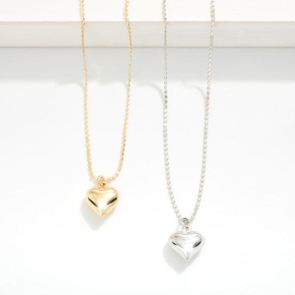 Flat Ball Chain Link Necklace Featuring Metal Tone Heart Pendant 

- Approximately 16" L 
- Extender 2" L 