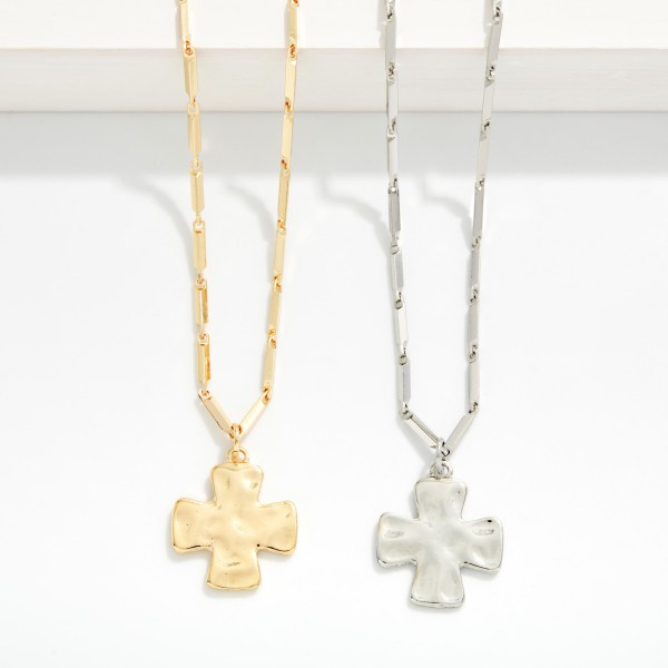 Metal Tone Bar Link Chain Link Necklace Featuring Hammered Metal Plus Cross Pendant 

- Approximately 14" L
- Extender 3" L