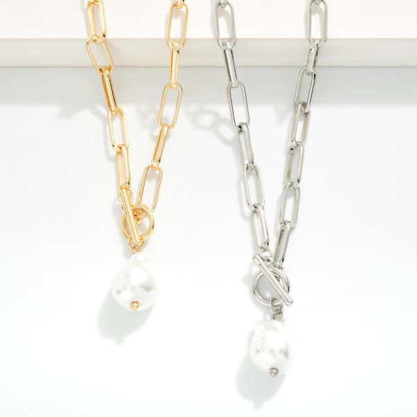 Metal Tone Paperclip Chain Link Necklace Featuring Toggle Clasp And Pearl Pendant 

- Approximately 18" L 