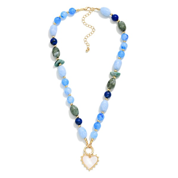 Marbled Acetate Beaded Necklace Featuring Gold Tone Beaded Stations & Heart Pendant 

- Approximately 18" L
- Extender 2" L 