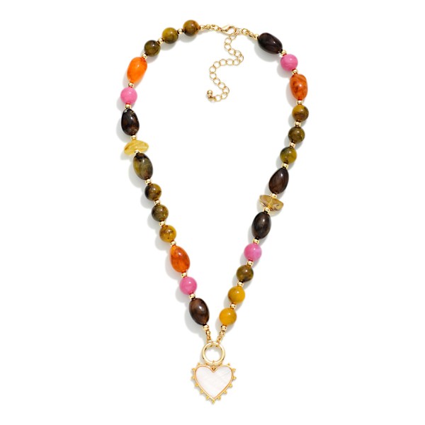 Marbled Acetate Beaded Necklace Featuring Gold Tone Beaded Stations & Heart Pendant 

- Approximately 18" L
- Extender 2" L 