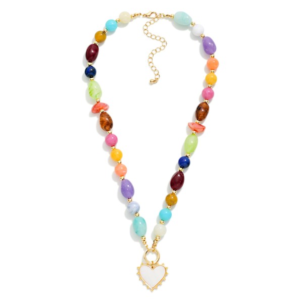 Marbled Acetate Beaded Necklace Featuring Gold Tone Beaded Stations & Heart Pendant 

- Approximately 18" L
- Extender 2" L 