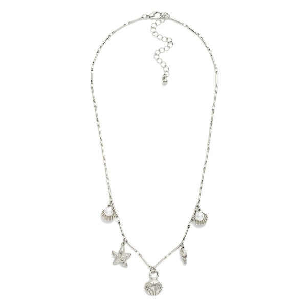 Metal Tone Bar Chain Link Necklace Featuring Beach Charms, Gold Tones, And Pearls 

- Approximately 18" L 
- Extender 2" L 