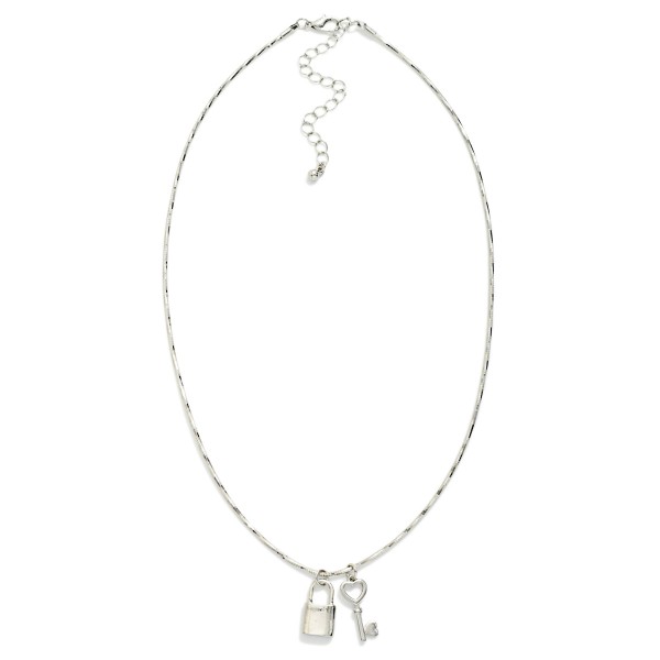 Stiff Chain Link Necklace Featuring Metal Tone Lock & Key Pendant 

- Approximately 16" L
- Extender 3" L