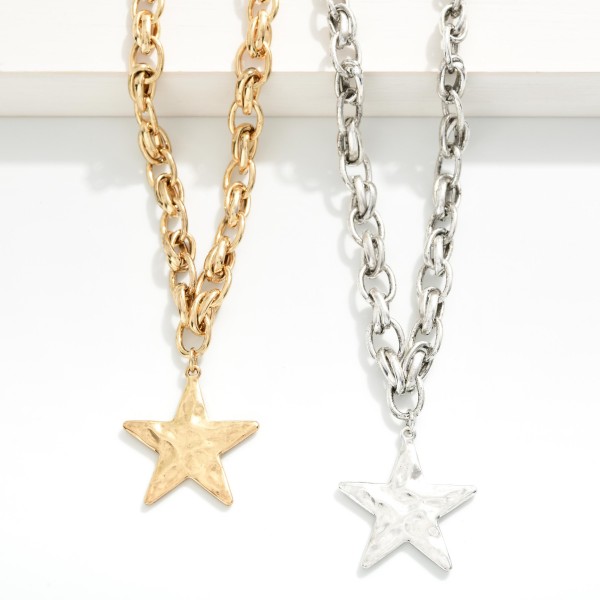 Oval Chain Link Necklace Featuring Hammered Star Pendant 

- Approximately 18" L 
- Extender 2" L