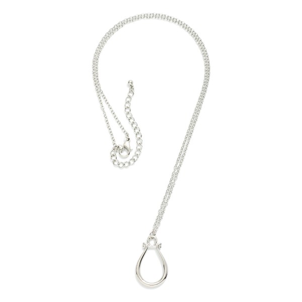 Chain Link Necklace Featuring Horsebit Pendant 

_ Approximately 22" L
- Extender 3" L