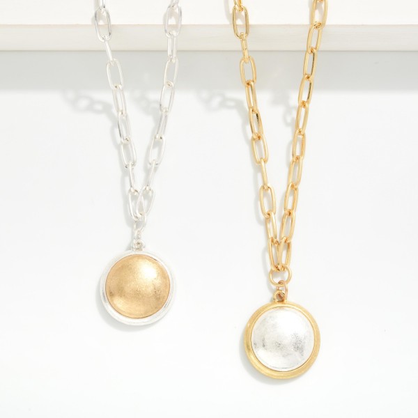 Paperclip Chain Link Necklace Featuring Two Tone Circle With Border Pendant 

- Approximately 16" L 
- Extender 3" L 