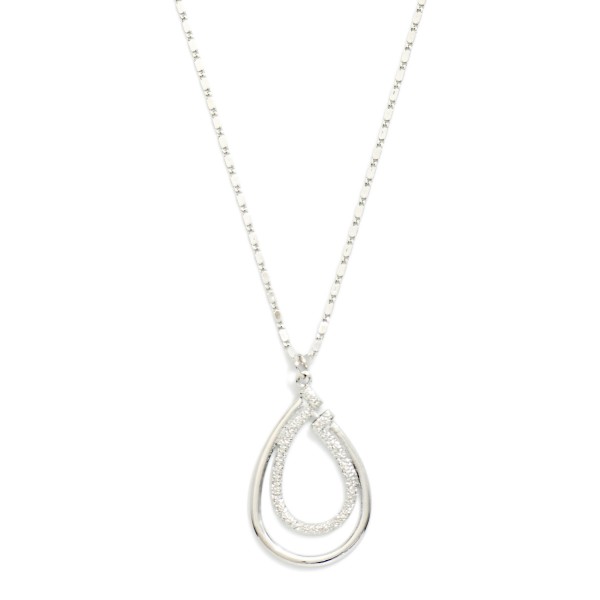 Metal Tone Chain Link Necklace Featuring Textured Nesting Teardrop Pendant  

- Approximately 20" L 
- Extender 3" L 