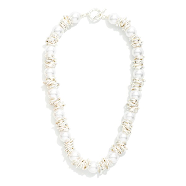 Beaded Necklace Featuring Pearl And Metal Rings Stations With Toggle Clasp 

-Approximately 16" L 