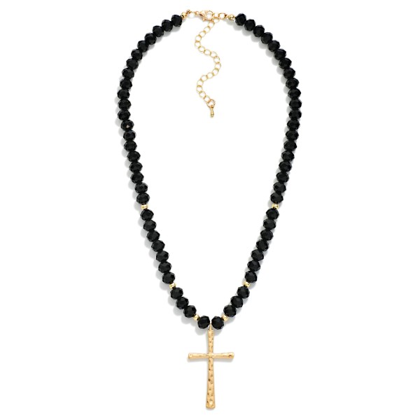 Faceted Glass Beaded Necklace With Cross Pendant  Featuring Gold Tones

- Approximately 20" L 