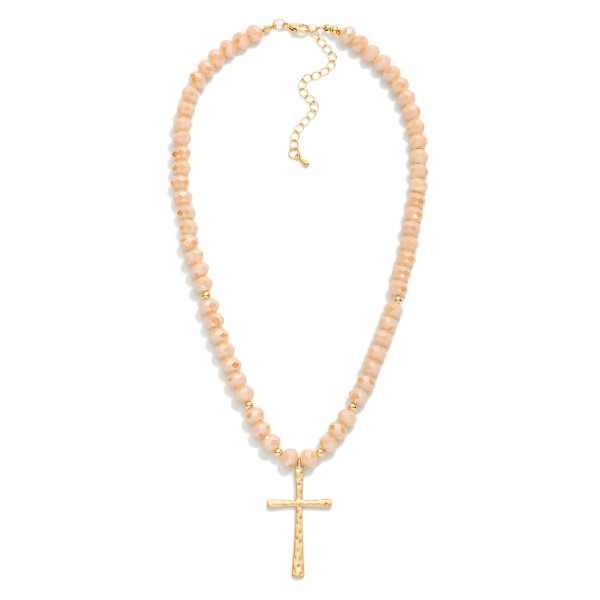 Faceted Glass Beaded Necklace With Cross Pendant  Featuring Gold Tones

- Approximately 20" L 