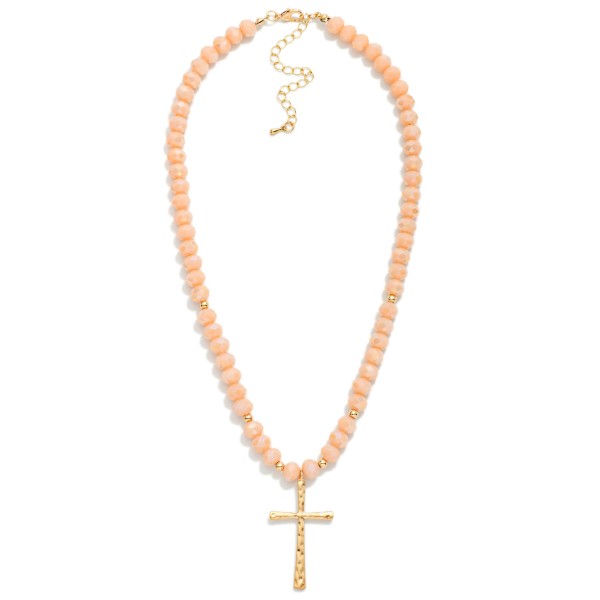Faceted Glass Beaded Necklace With Cross Pendant  Featuring Gold Tones

- Approximately 20" L 