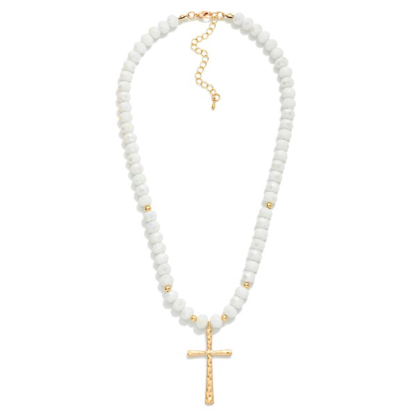 Faceted Glass Beaded Necklace With Cross Pendant  Featuring Gold Tones

- Approximately 20" L 