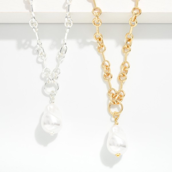 Horsebit Link Chain Link Necklace Featuring Baroque Pearl Pendant

- Gold Dipped 
- Approximately 16" L
- Extender 3" L 

