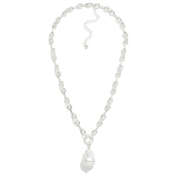 Horsebit Link Chain Link Necklace Featuring Baroque Pearl Pendant

- Gold Dipped 
- Approximately 16" L
- Extender 3" L 

