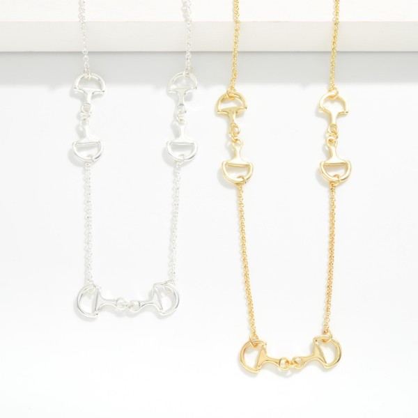 Chain Link Necklace With Horsebit Stations 

- Gold Dipped 
- Approximately 16" L
- Extender 3" L