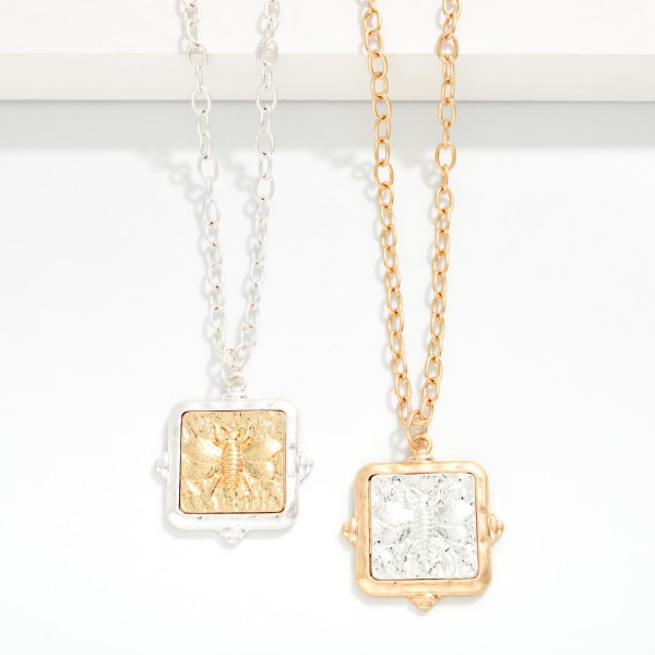 Chain Link Necklace Featuring Two Tone Square Pendant With 3D Bee Detail 

- Approximately 14" L
- Extender 3" L