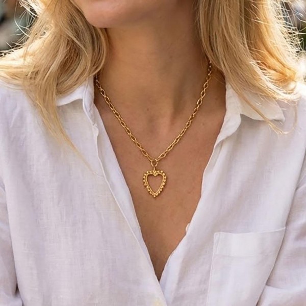 Metal Tone Paperclip Chain Link Necklace Featuring Hollow Heart Pendant 

- Approximately 16" L
- Extender 3" L 