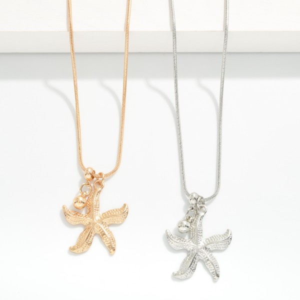 Snake Chain Necklace Featuring Metal Tone Starfish Pendant 

- Approximately 22" L
- Extender 3" L