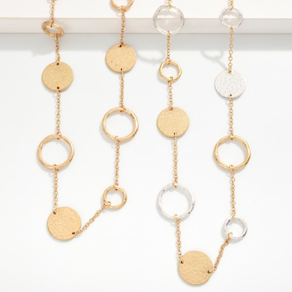 Long Chain Link Necklace Featuring Hammered Metal Medallion & Hoop Stations 

- Approximately 38" L
- Extender 3" L