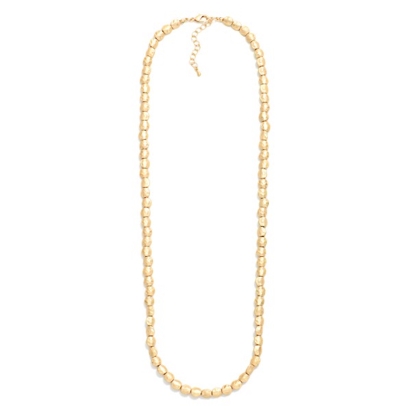 Long Hammered Metal Nugget Beaded Necklace

- Approximately 24" L
- Extender 3" L 