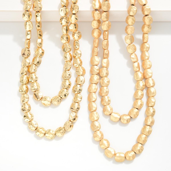 Layered Hammered Metal Nugget Beaded Necklace 

- Approximately 18" L
- Extender 3" L