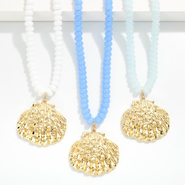 Candy Bead Beaded Necklace Featuring Metal Tone Shell Pendant 

- Approximately 20" L 
- Extender 3" L 