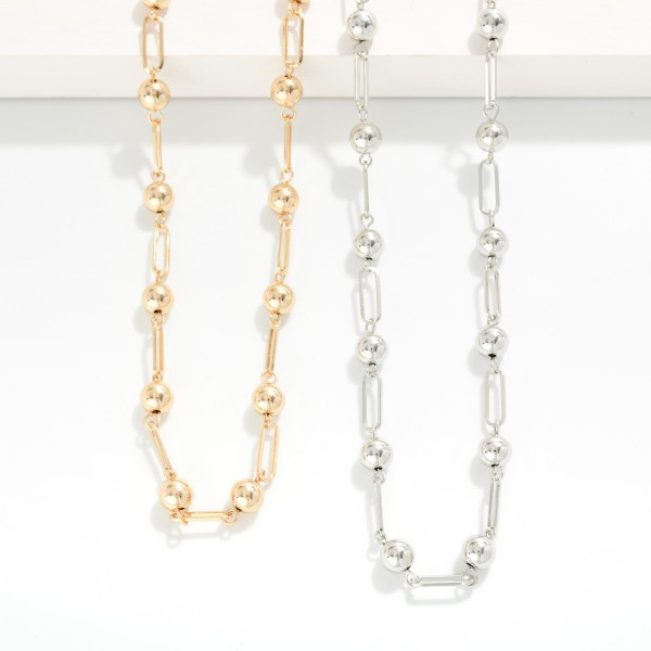 Paperclip Chain Link Necklace Featuring Metal Ball Stations

- Approximately 36" L
- Extender 3" L

