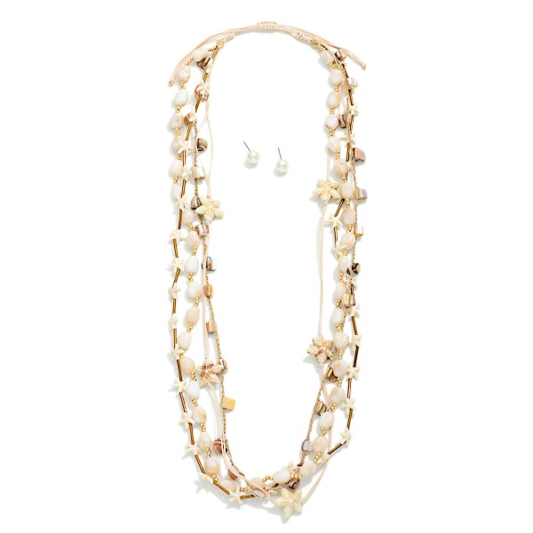 Adjustable Long Layered Necklace Featuring Stones, Metal Tones, & Ceramic Starfish Beads 

- Pearl Stud Earrings Included 
- Approximately 30" L
