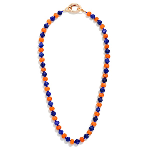 Game Day Faceted Bead Beaded Necklace Featuring Metal Tone Oval Clasp Pendant

- Approximately 16" L