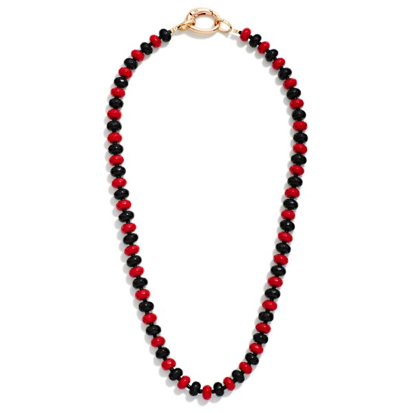 Game Day Faceted Bead Beaded Necklace Featuring Metal Tone Oval Clasp Pendant

- Approximately 16" L