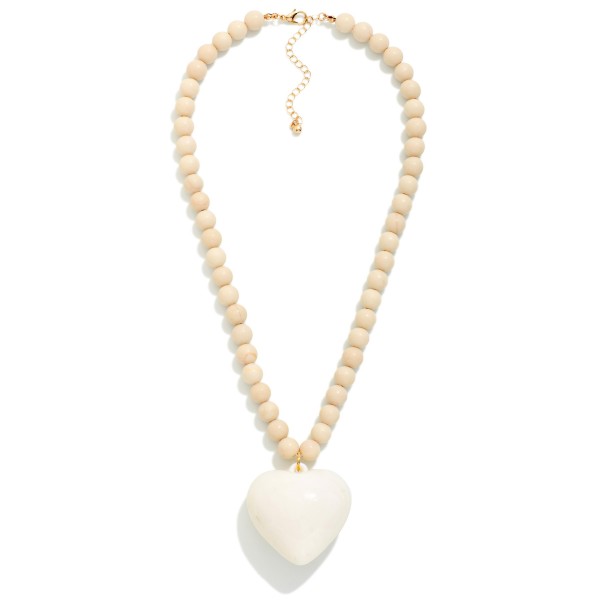 Stone Beaded Necklace Featuring Acrylic Heart Pendant 

- Approximately 16" L
- Extender 3" L