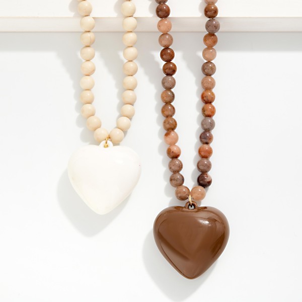 Stone Beaded Necklace Featuring Acrylic Heart Pendant 

- Approximately 16" L
- Extender 3" L