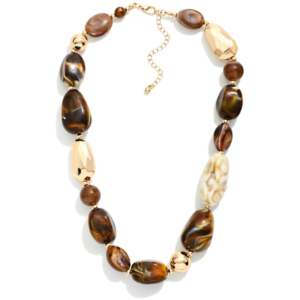Chunky Beaded Necklace Featuring Faceted Metal Tones & Marbled Acetate Beads 

- Approximately 16" L
- Extender 3" L