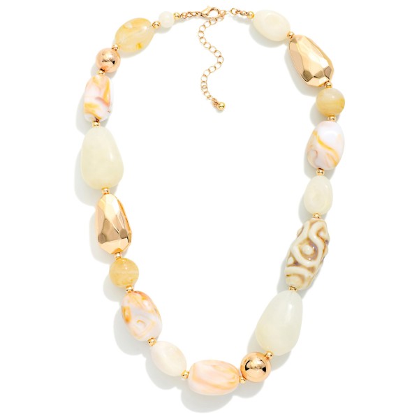 Chunky Beaded Necklace Featuring Faceted Metal Tones & Marbled Acetate Beads 

- Approximately 16" L
- Extender 3" L
