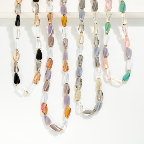 Faceted Twisted Cylinder Beaded Necklace 

- Approximately 16" L
- Extender 3" L