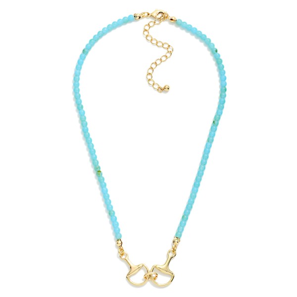 Turquoise Stone Beaded Necklace Featuring Metal Tone Stationary Horsebit Pendant 

- Gold Dipped 
- Approximately 16" L
- Extender 3" L